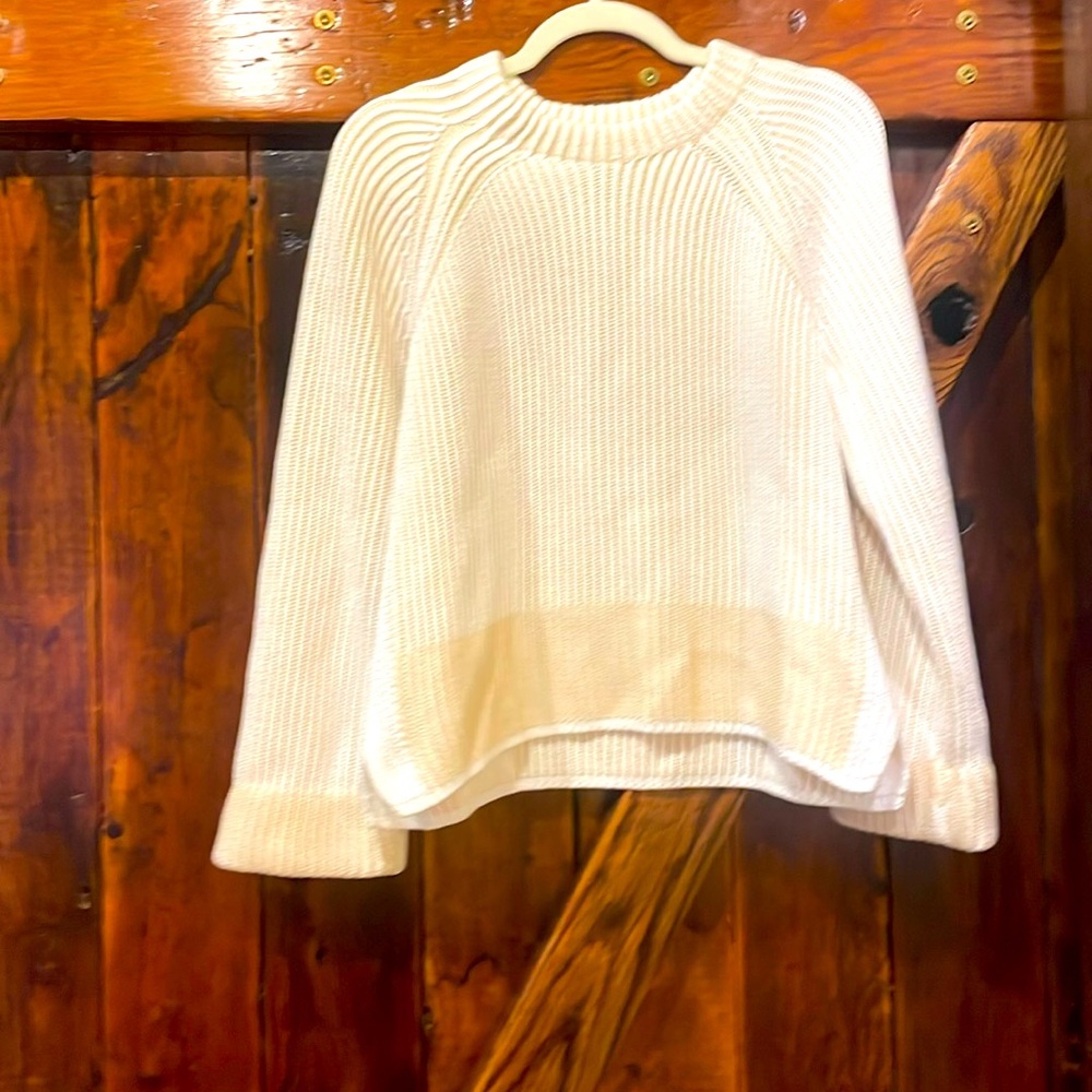 Gorgeous me + em sweater that’s cream and white stripes